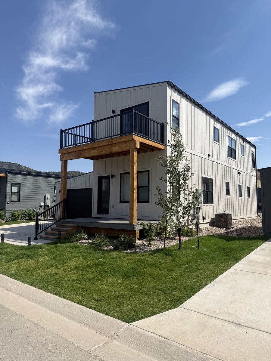 New construction townhome with fresh landscaping and lawn in a Gypsum, Colorado community